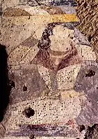 Devotee in double-lapel caftan, left wall of the niche of the 53 meter Buddha. Bamiyan