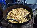 Banana chips getting deep fried at a shop in Palakkad, Kerala, India.