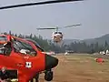 Example of a helibase, this one at Weaverville, California, during the Bar Complex Fire. USFS Bell AH-1 Cobra nose is in the foreground