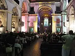 Inside the church, showing part of the nave and the main chapel