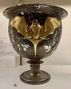 Bat goblet by Henri Husson made of embossed and hammered copper, gold and silver applications (c. 1909)