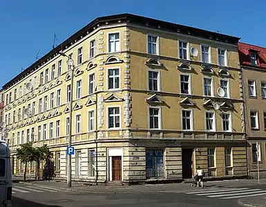 View of the tenement from the street crossing