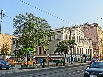 View from Gdanska street, with the Pomeranian Arts House on the front and yellow facade of BWA on the back