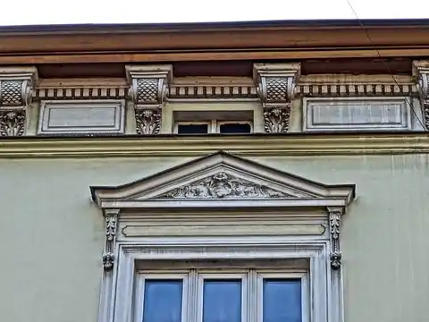 Pediment and corbels