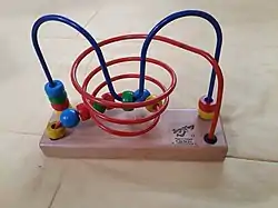 Image 5A bead maze (from List of wooden toys)