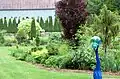 A perennial bed with barn in the background