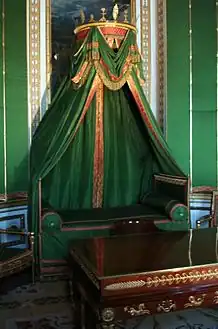 A baldachin in Empire style above a daybed