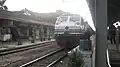 CC203 38 locomotive arriving at Bekasi station