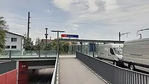 Ramp leading to canopy-covered platforms