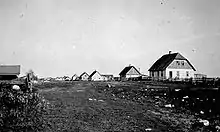 Jewish farmhouses in Bender Hamlet, Manitoba, 1921.