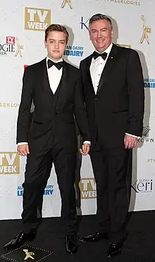 Photograph of Benson Jack Anthony and Erik Thomson in tuxedos