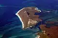 Image 12Aerial view of the low-lying island of Berneray in the Outer Hebrides, known for its sandy beaches backed by machairCredit: Doc Searls