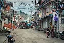 Main street of Besishahar Municipality in the morning.