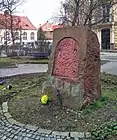 The memorial stone without the commemorative plaque