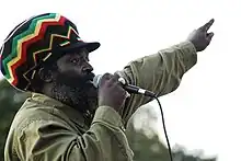 Bigga Haitian performing at McCarren Park Pool