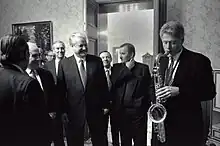 President Clinton playing a saxophone presented to him by the President of Russia, Boris Yeltsin.(McNeely, 1994)