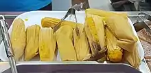 Pintos, also known as Binaki, is a Philippine steamed corn sweet tamales that is served in both Bukidnon and Cebu, particularly in Bogo.