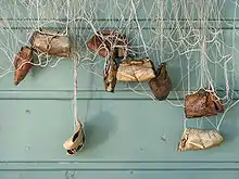 Finnish fishing net corks made out of birch bark and stones