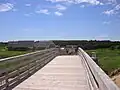 Boardwalk leading from main entrance to beach