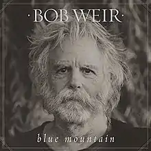 A black-and-white head shot of Bob Weir