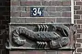 Scorpio adorning a building in Hamburg, Germany, designed by sculptor Richard Kuöhl.