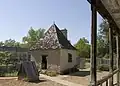 Reconstructed kitchen building at rear of house