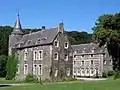 Het kasteel en de boerderij van Bolland en het ensemble van het kasteel, de boerderij, de kerk en het park