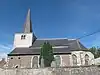 Het koor en de toren van de kerk van Saint-Jean Baptiste