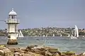 Bradleys Head Light at low-tide, showing the foundation