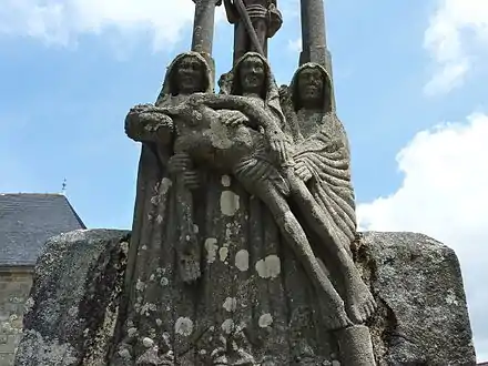 The piéta at the base of the crucifixion cross. Part of the Brasparts calvary