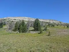 Breccia Peak from southeast while ascending on normal route. The steep cliff in the middle can be passed on the left or on the right.