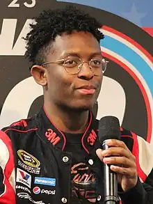 Musician Breland with a microphone