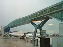 This skyway at London Gatwick Airport is designed to allow aircraft to pass under