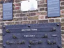 Image 38Yard, foot and inch measurements at the Royal Observatory, London. The British public commonly measure distance in miles and yards, height in feet and inches, weight in stone and pounds, speed in miles per hour. (from Culture of the United Kingdom)