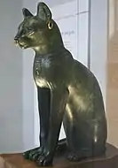 Room 4 – Ancient Egyptian bronze statue of a cat from the Late Period, c. 664–332 BC