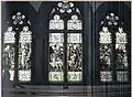 Photograph of six stained glass Britomart windows at Cheltenham Ladies College.