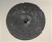 Bronze mirror, Gansu. Qijia culture (2400–1900) National Museum of China