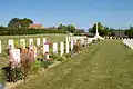 Graves and cross in the cemetery