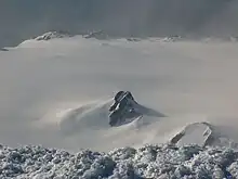 Bulgarian Beach from Mount Friesland, with Castillo Nunatak and Willan Nunatak in the foreground, Balkan Snowfield in the middle, and left to right in the background Atlantic Club Ridge, Hesperides Hill, Pesyakov Hill and Sinemorets Hill with the Bulgarian base in between, and Spanish Knoll