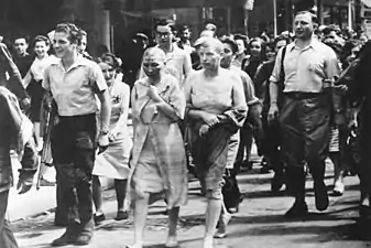 Women accused of sleeping with Germans had their heads shaved (Bundesarchiv, June 21, 1944)