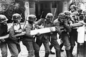 German soldiers dismantling a Polish border checkpoint