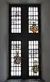 Stained glass coats of arms in the great hall windows