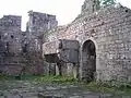 Fireplace in the great hall. In Wolframs Parzival the author indirectly compares the gigantic fireplace in the Grail Castle with that of Wildenberg: “so groziu fiwer sit noch e sach niemen hie ze Wildenberc” (line 230,12-13)