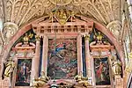 The upper region of the altar, with the central canvas of the Assumption