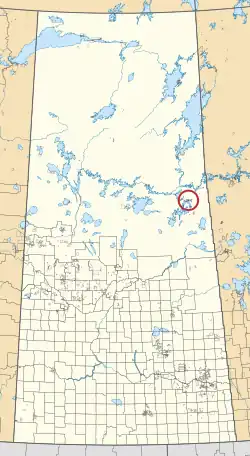 A map of the province of Saskatchewan showing 297 rural municipalities and hundreds of small Indian reserves. One is highlighted with a red circle.