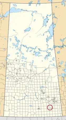 A map of the province of Saskatchewan showing 297 rural municipalities and hundreds of small Indian reserves. One is highlighted with a red circle.