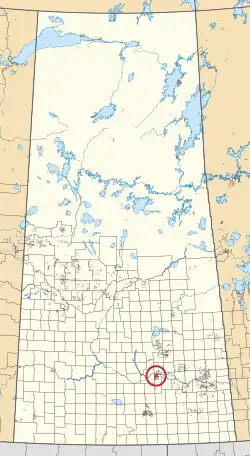 A map of the province of Saskatchewan showing 297 rural municipalities and hundreds of small Indian reserves. One is highlighted with a red circle.