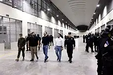 Nayib Bukele and four of his government officials touring the Terrorism Confinement Center (CECOT) before opening.