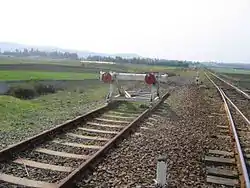 Al-Akkari railway station, looking west. The former Palestine Railway route to Tripoli, Lebanon to the left and the route to the port city of Tartus to the right