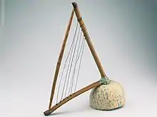 A loma belly harp, played by the Crau, Crau, Krao, Krawi, Kru, Nana peoples of West Africa.